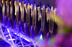 Trophies lined up on stage