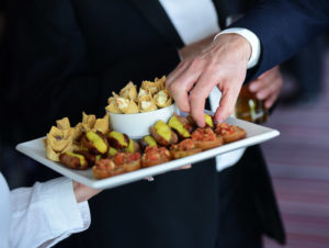 hand taking canapes