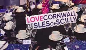 Love Cornwall and Isles of Scilly sign on table